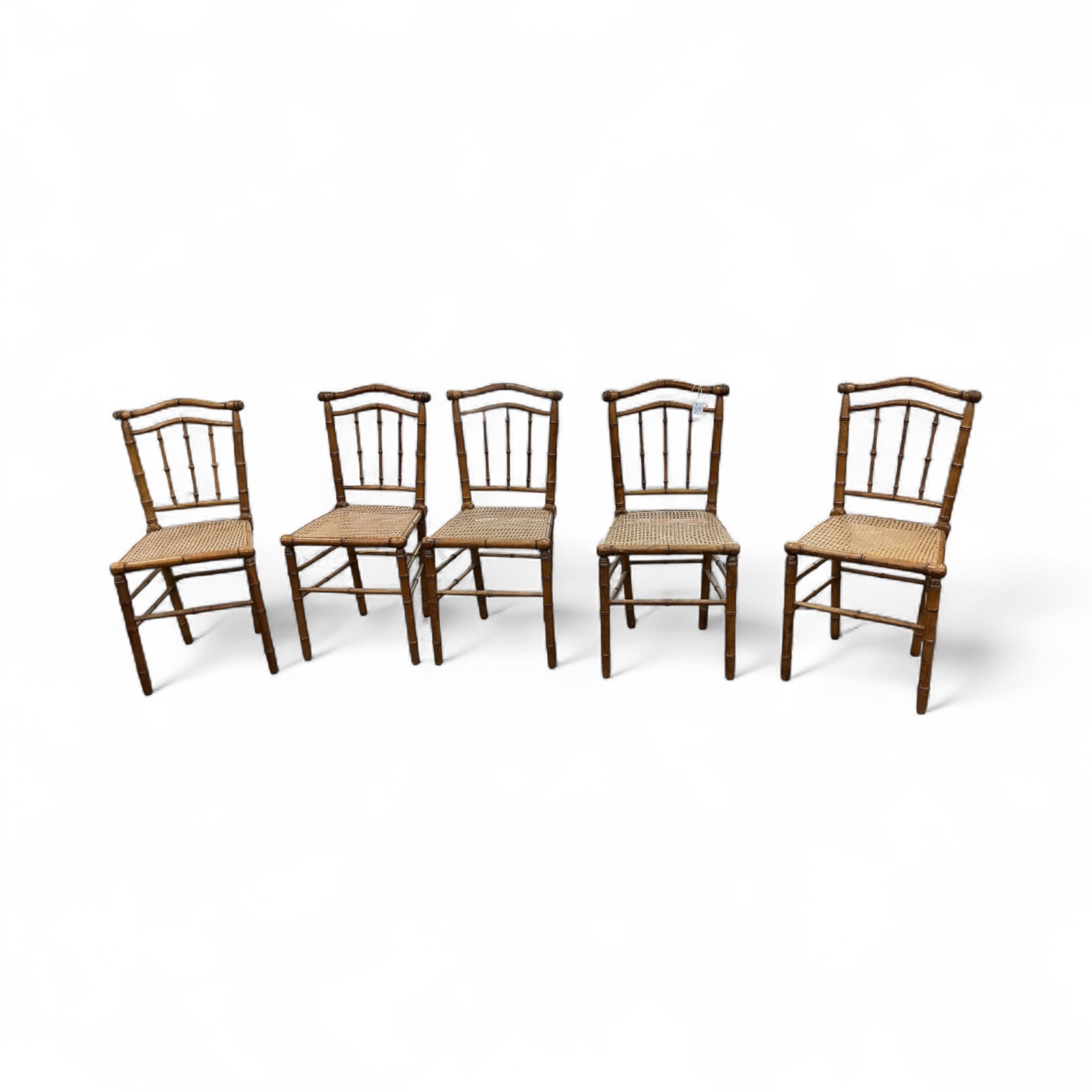 Five late 19th century French faux bamboo cane seat chairs, width 42cm, height 89cm